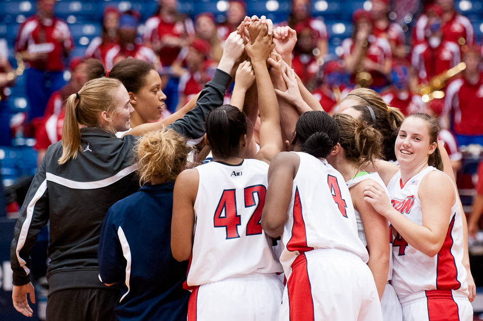The University of Dayton women's basketball game huddles together after knocking off No. 13 Vanderbilt University at UD Arena, Nov. 18, 2012, in Dayton, Ohio. UD won 71-66.